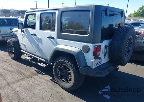 2014 Jeep Wrangler Unlimited Rubicon X из США, поврежденный, VIN 1C4HJWFG0EL179914